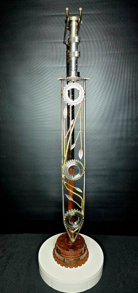 Symbolic metal sword sculpture inspired by Artemisia Gentileschi, forged from reclaimed steel by Enrique Del Angel.