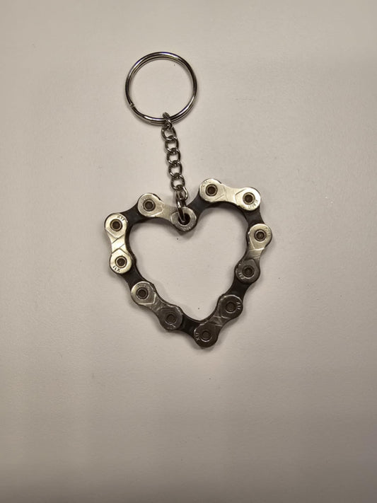 Pocket Sculptures welded steel heart keychain by Enrique Del Angel handcrafted from an upcycled mechanical bicycle chain