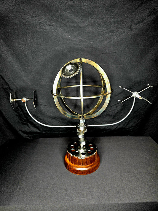 Metal spherical sci-fi device with gold frame and central circular grid