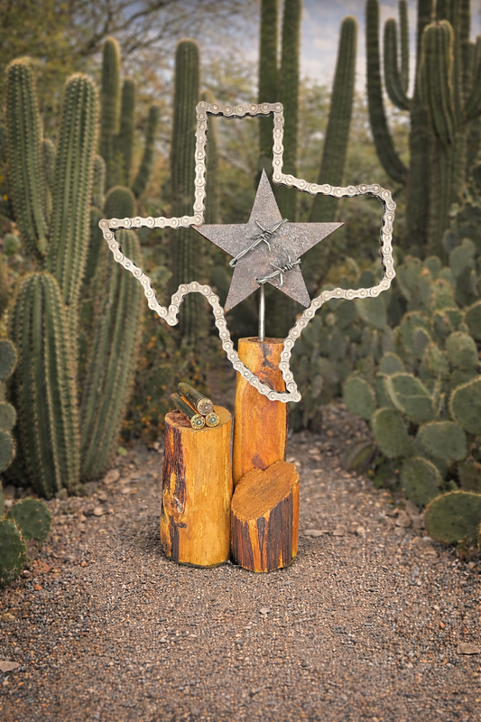 Handcrafted Texas metal sculpture featuring spent brass shells, barbed wire, and the Lone Star, made from reclaimed steel by Enrique Del Angel.